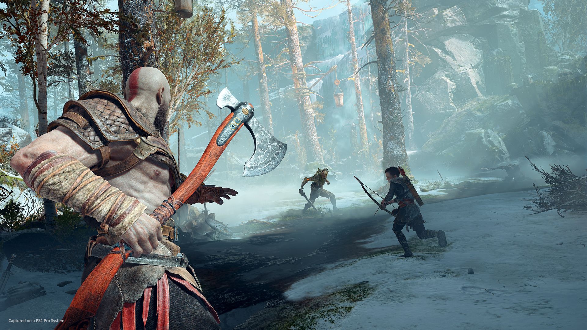 gow004 Kratos au combat avec son fils Atreus