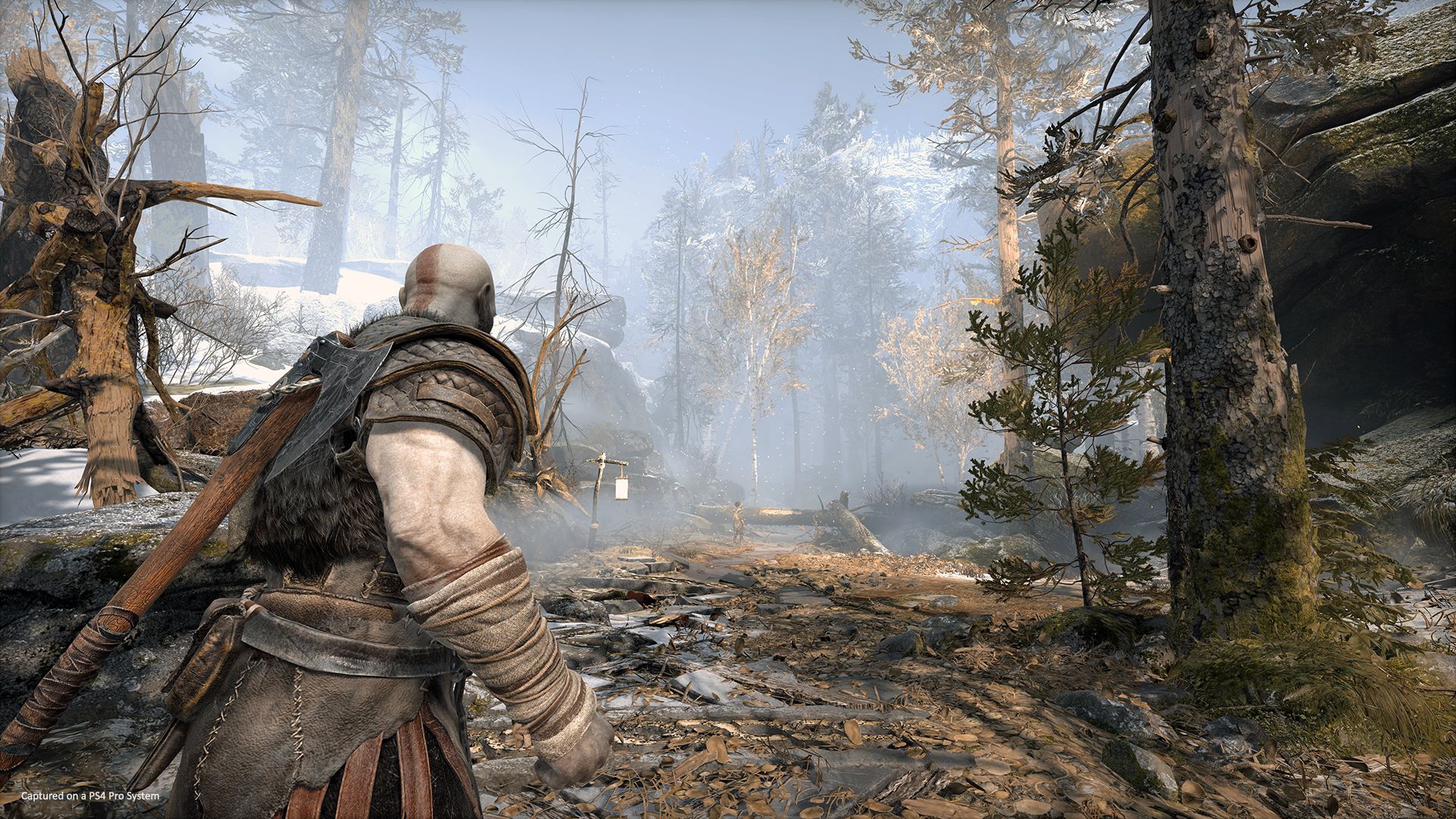 Kratos dans un paysage nordique de God of War